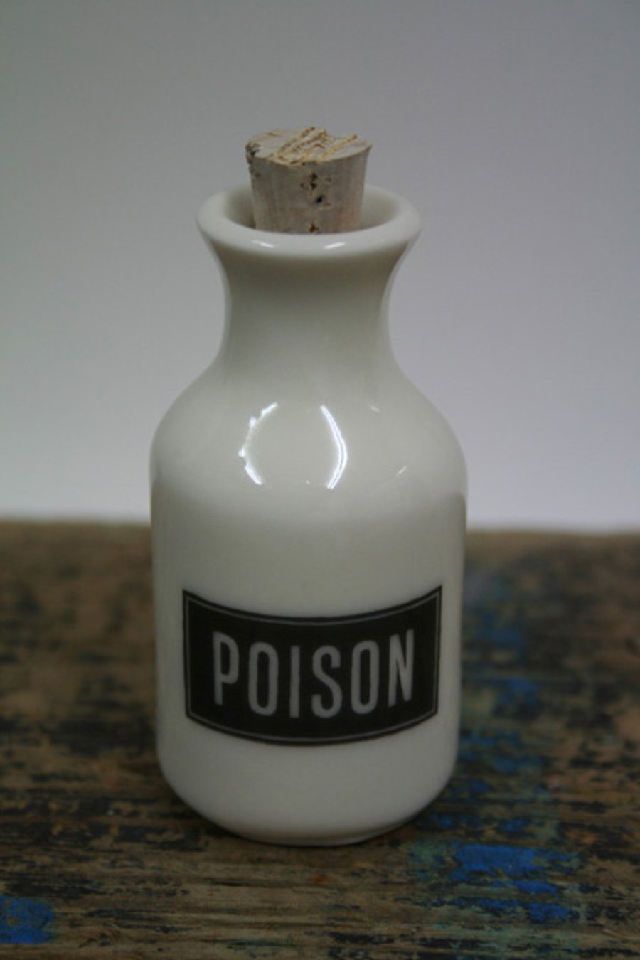 Small porcelain bottle with poison wording