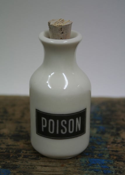 Small porcelain bottle with poison wording