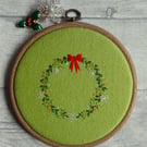Hand Embroidered Festive Wreath on Green Wool Felt in Decorative Hoop