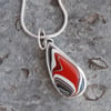 Small red fordite and silver pendant