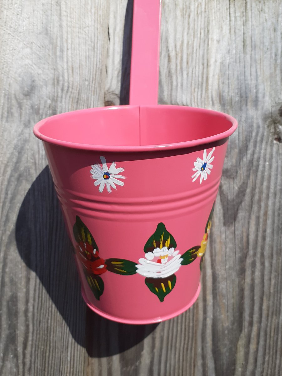 Round hanging planter handpainted with canal art style roses and daisies