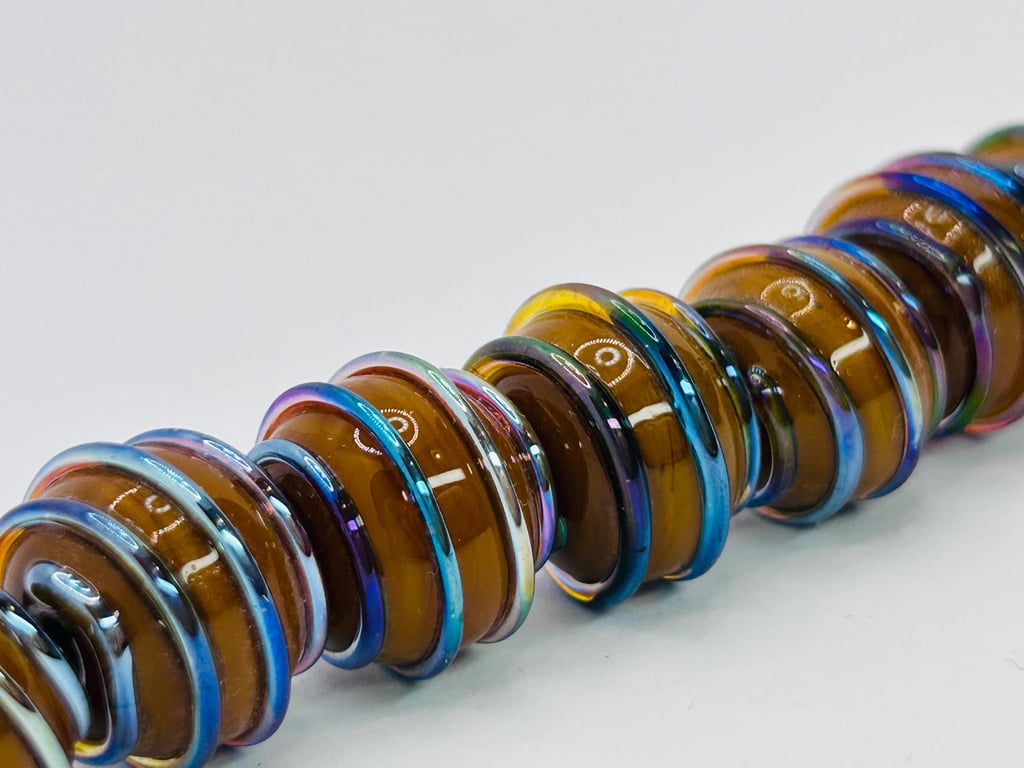 Handmade brown and iridescent stripey lamp work glass beads