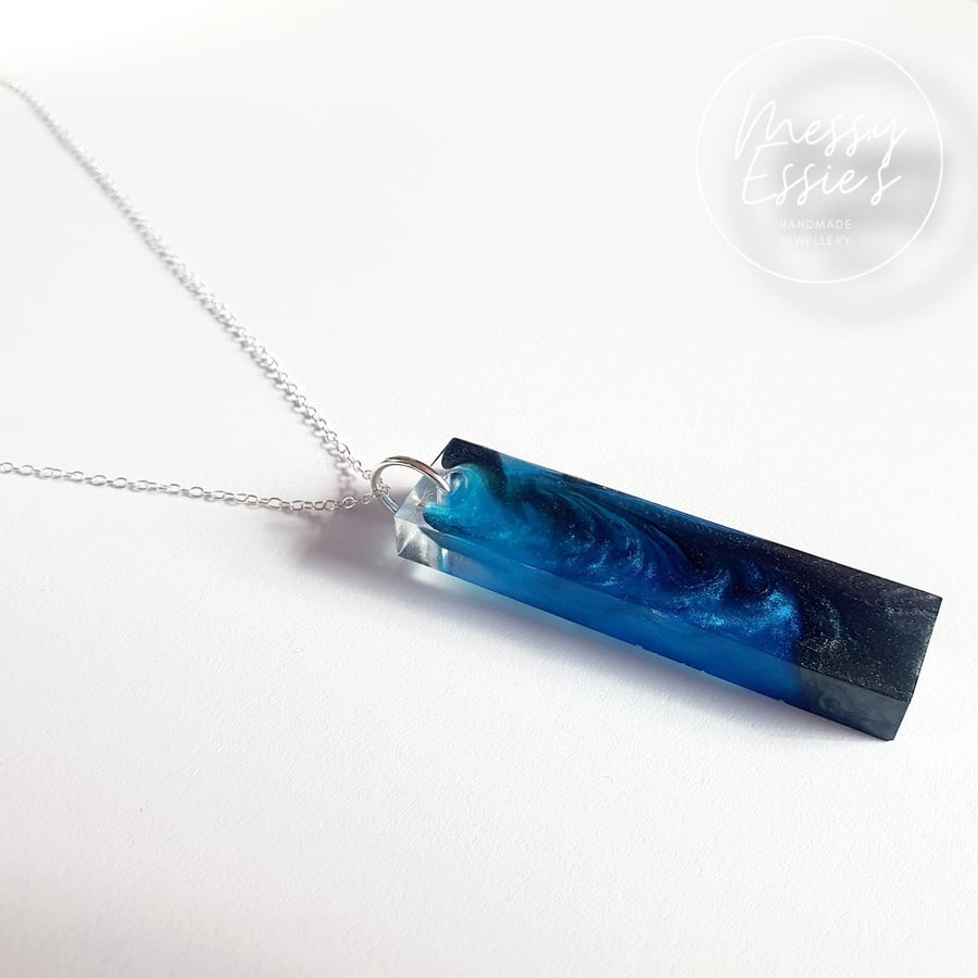 Blue and black resin pendant