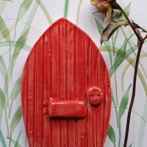Red ceramic fairy door
