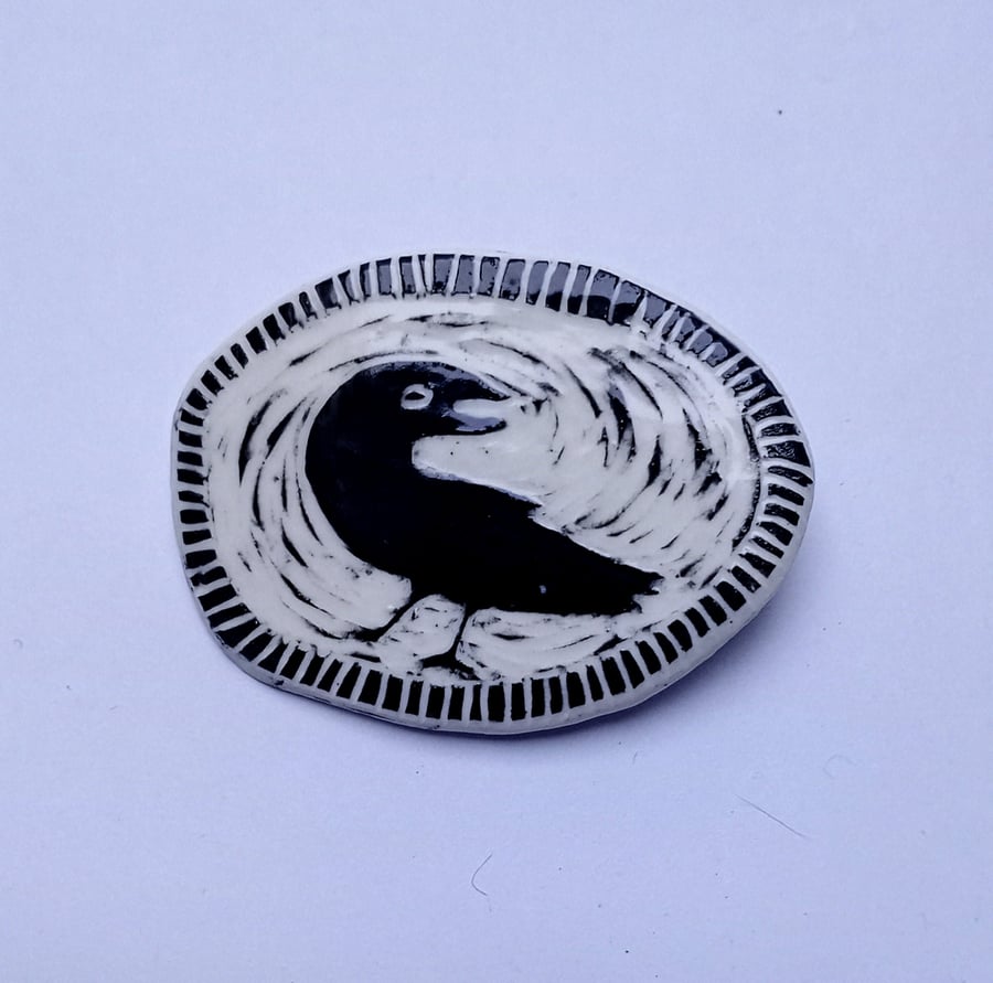 porcelain crow brooch