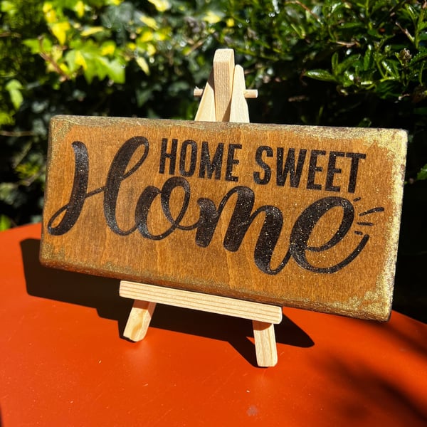 Small wooden home sign