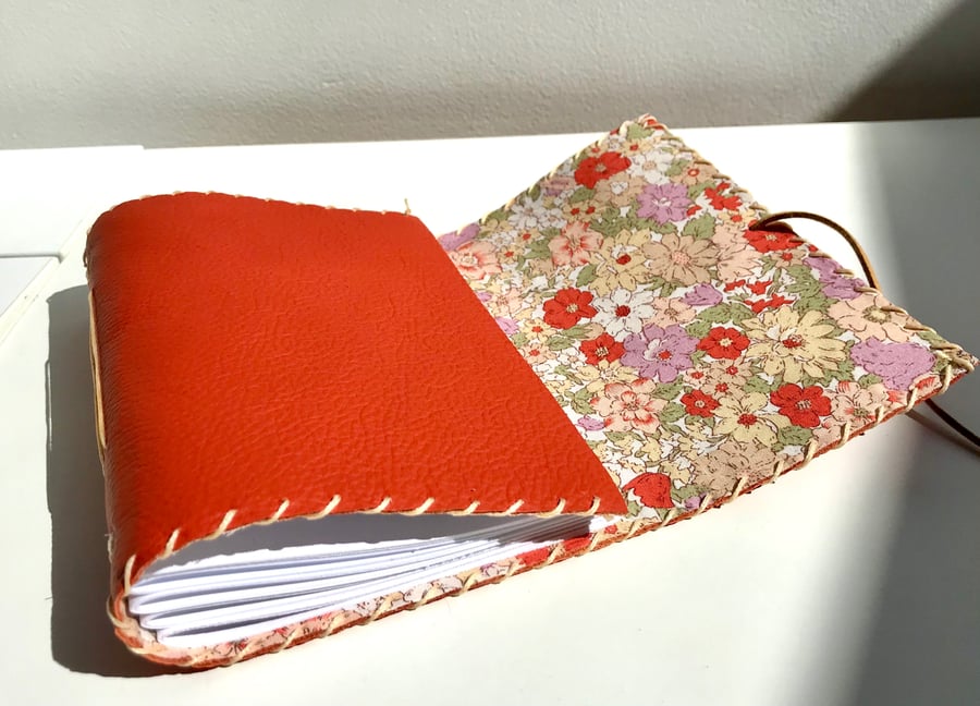 A6 Fold over handmade Orange Leather notebook journal floral fabric lining