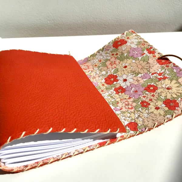 A6 Fold over handmade Orange Leather notebook journal floral fabric lining