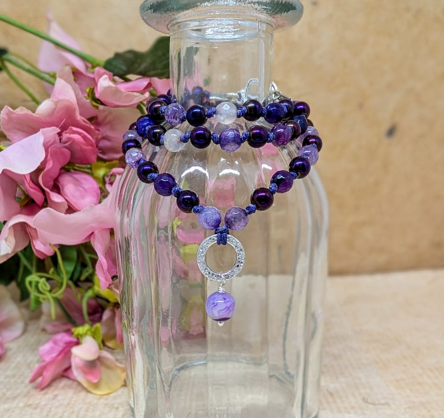 Purple hematite and agate knotted cord necklace with silver ring pendant