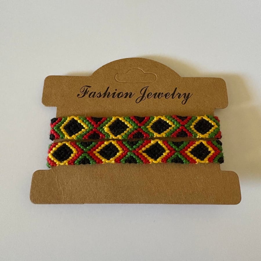 Black, red, yellow and green bracelet set 