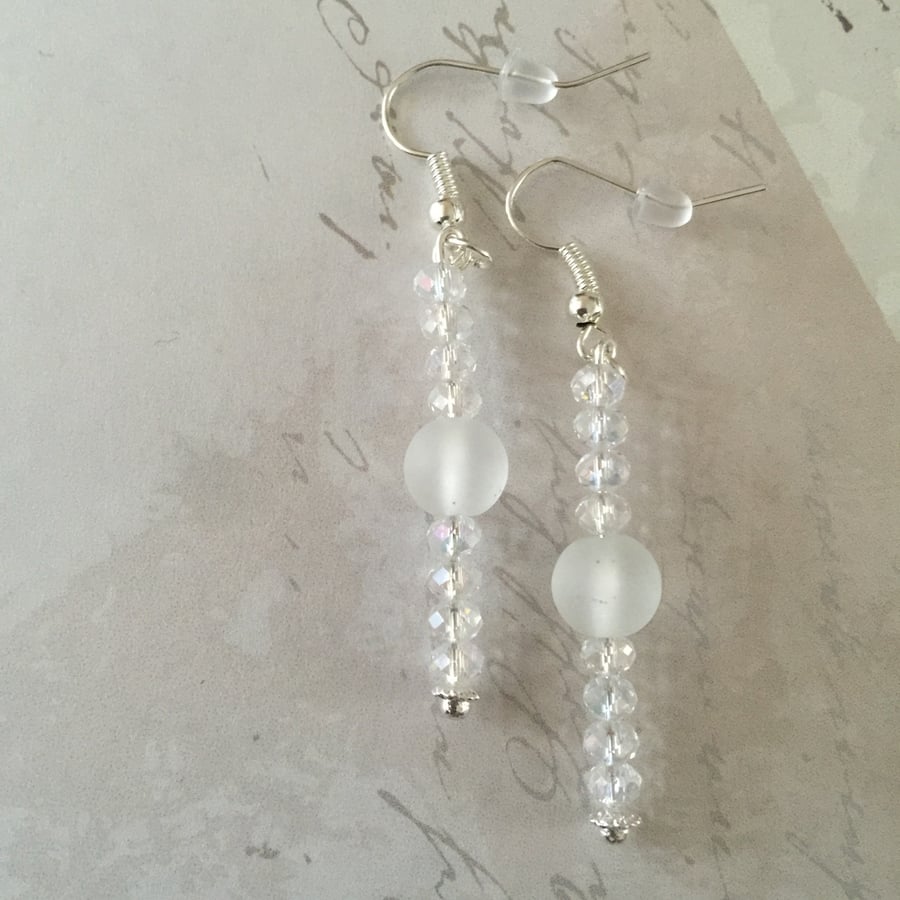 Frosted and clear faceted beaded dangle earrings