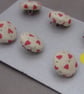 6 Tiny Handmade Cream and Red Heart Buttons - Image 1