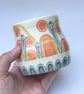 Ceramic hand thrown pot with unique orange and blue decoration - Image 10