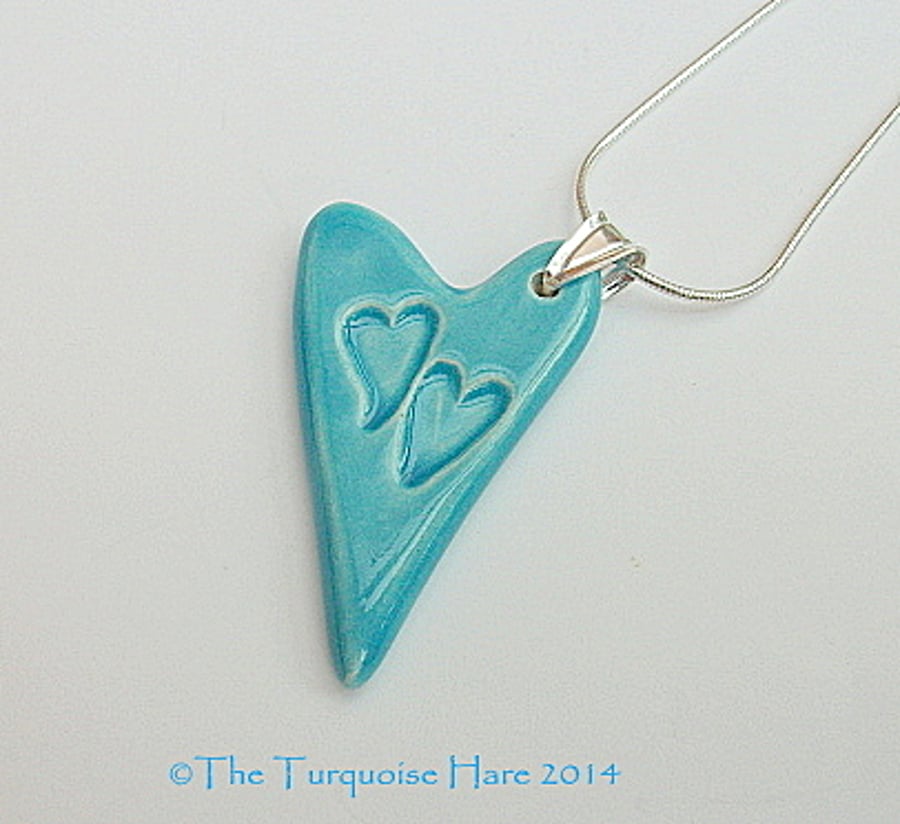 Ceramic heart pendant  necklace impressed with two hearts - Sterling silver 