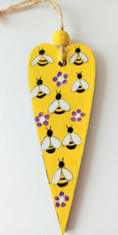 Bees and flowers on a heart shape 