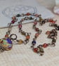 Multicoloured agate necklace with copper wirework and glass pendant  - Image 4