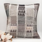Light grey patchwork cushion cover with envelope back.  