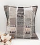 Light grey patchwork cushion cover with envelope back.   - Image 1