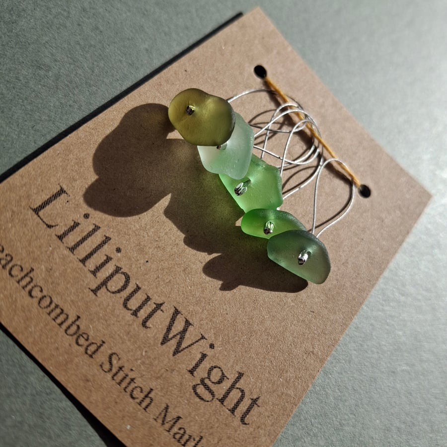 Five snag free sea glass stitch markers in shades of green