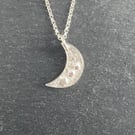 Silver crescent moon and stars pendant 