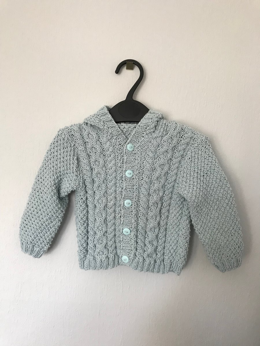 Textured baby jacket with hood
