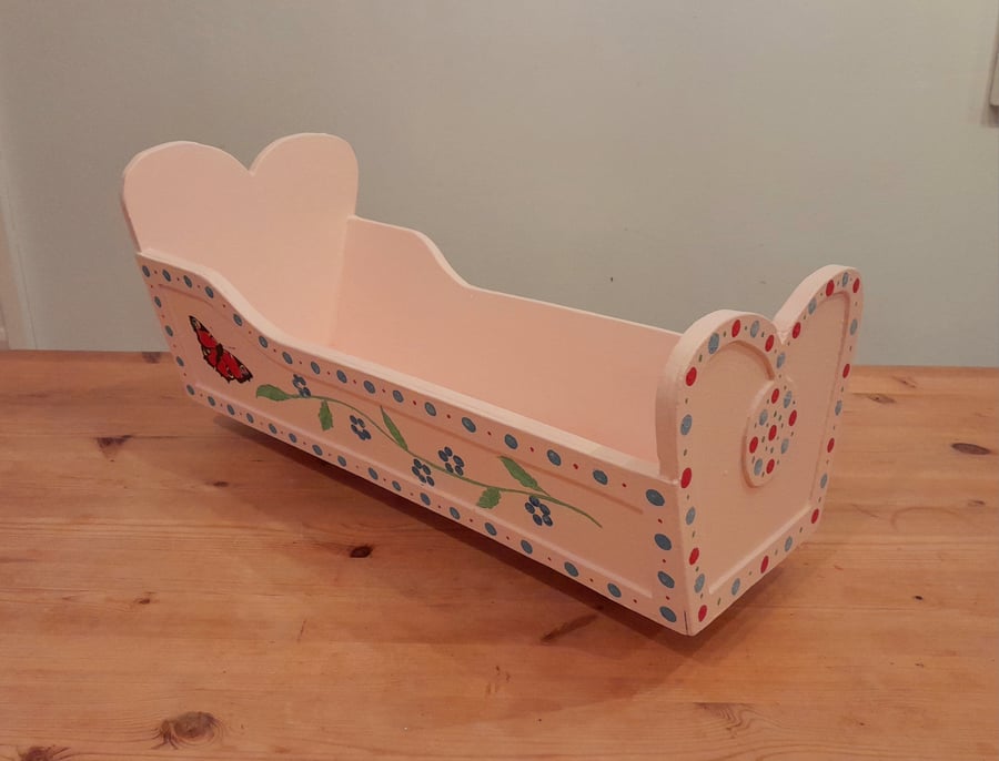Hand painted miniature dolls cradle