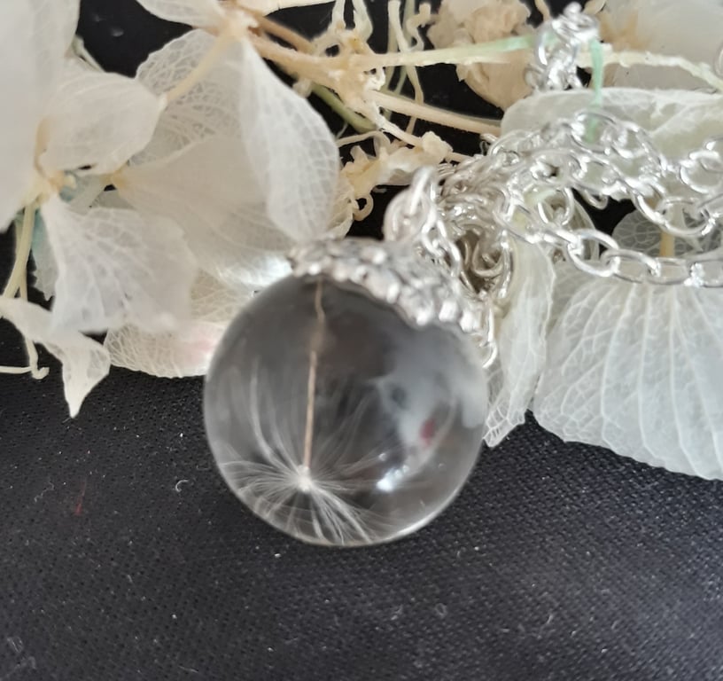 R17. resin globe with dandelion seed