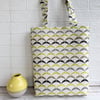 Geometric patterned tote bag in cream, mustard and grey