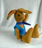 Lupin, a 16" fleece unjointed rabbit with neckerchief and knitted waistcoat. - Image 8