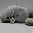 Silver hagstone pendant - molten silver - nugget 
