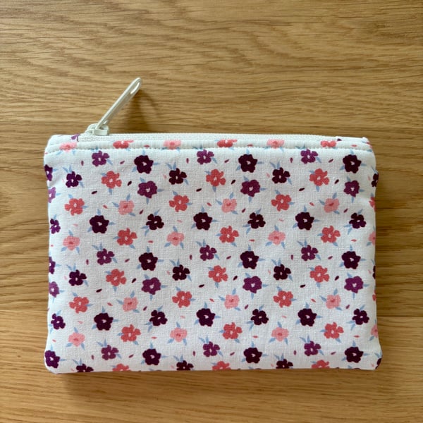 Small zipped fabric purse, pouch, make up bag, in cream and pink floral print.