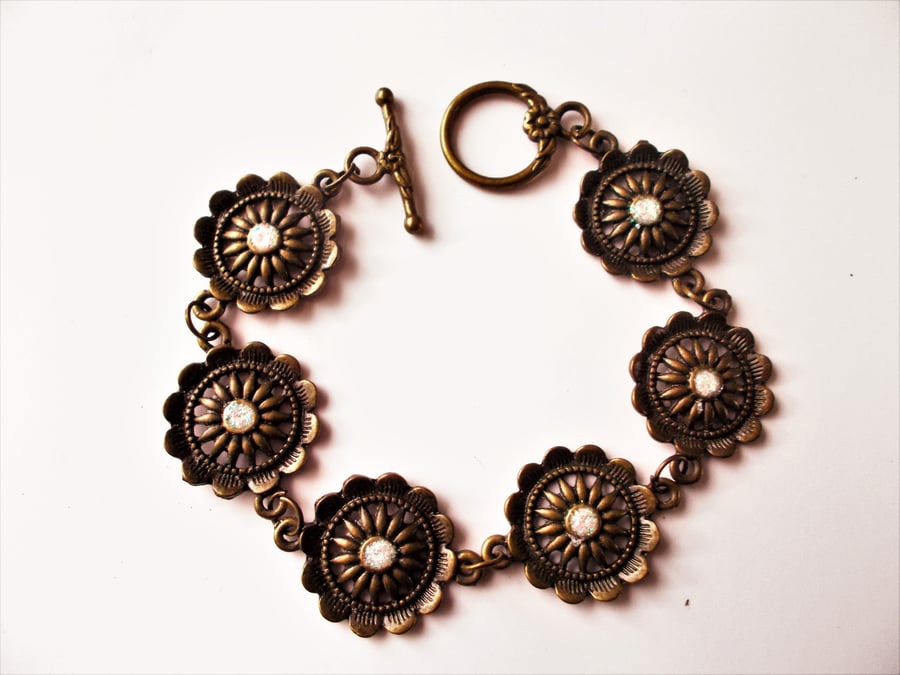 Bronze tone wheel bracelet 
