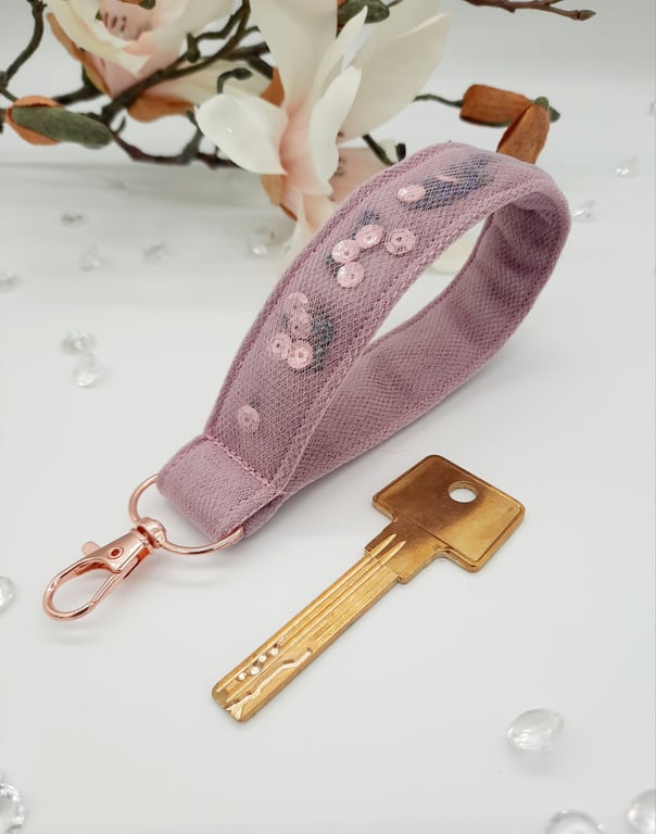Pink wristlet keyfob,  with pink tulle, sequins and dark metallic seed beads. 