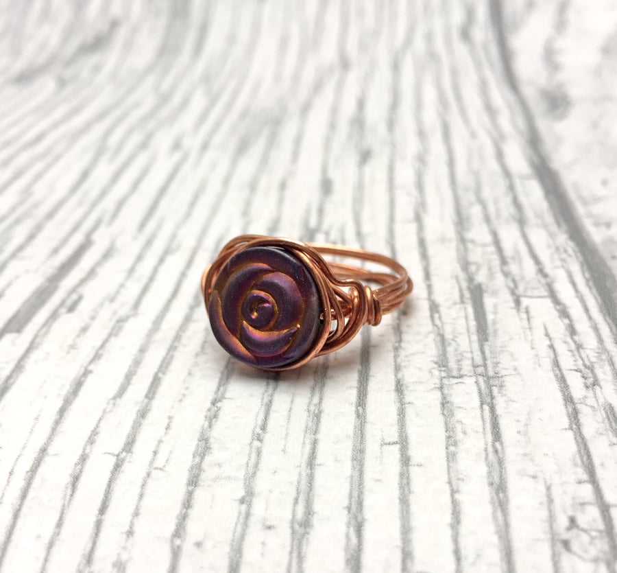 Purple matte metallic hematite Rose bead,  copper wire wrapped ring