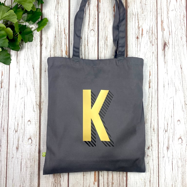 Organic cotton tote bag. Grey shopper with bright rainbow colour letter.