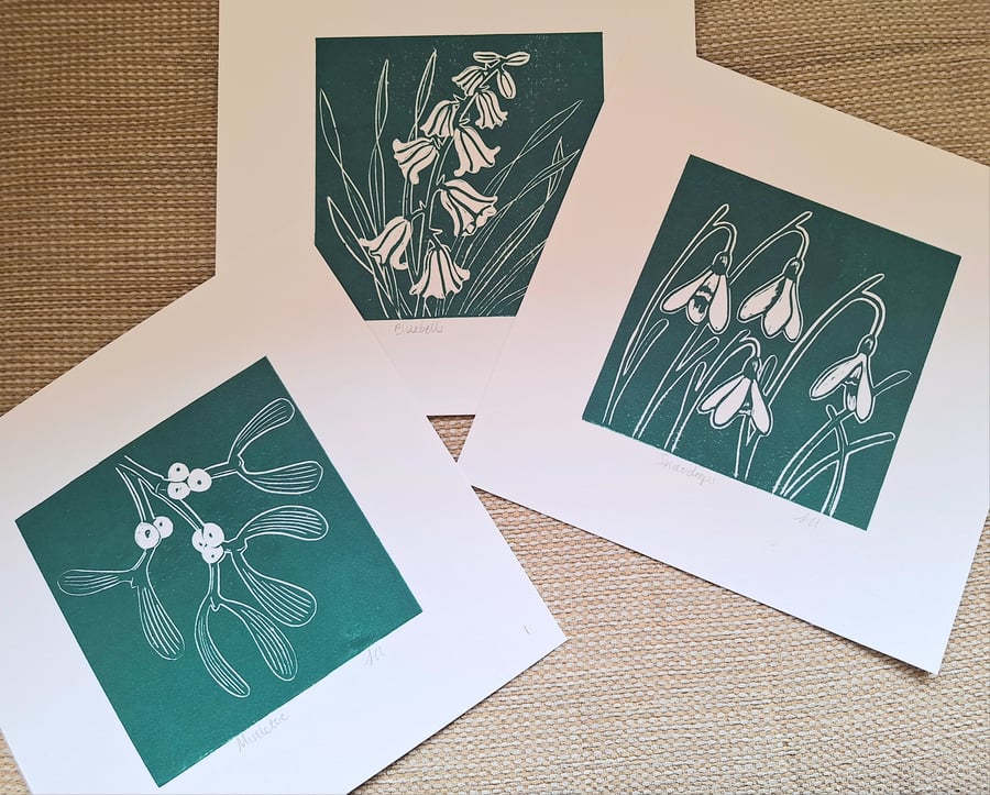 An original handprinted linoprint of either mistletoe,  bluebells or snowdrops.