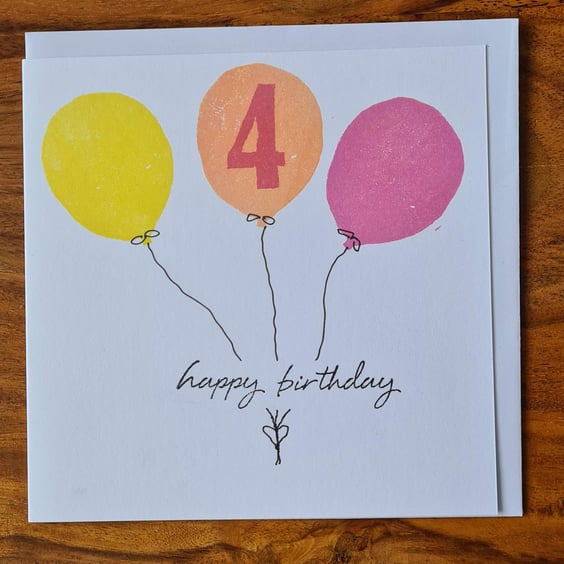Numbered balloon birthday card handprinted yellow pink