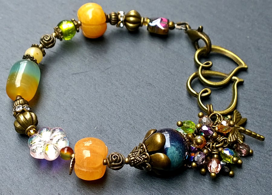 Enchanted Garden Bracelet, Double Heart Clasp and Orange Tones. Gaia, Nature
