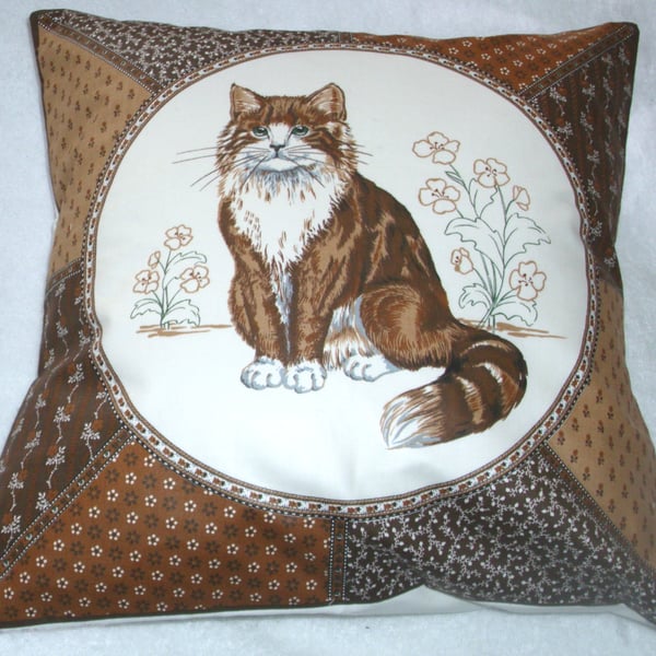 A very pretty brown and white fluffy cat cushion