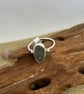 Sterling silver handmade ring set with green sea glass 