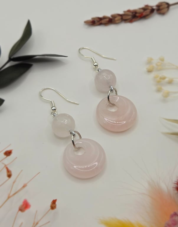 Polished rose quartz donut dangle earrings with sterling silver hooks
