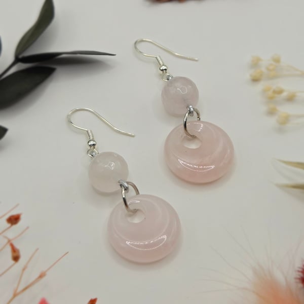 Polished rose quartz donut dangle earrings with sterling silver hooks