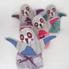 free motion and hand embroidered miniature zombie penguin in silk pyjamas blue