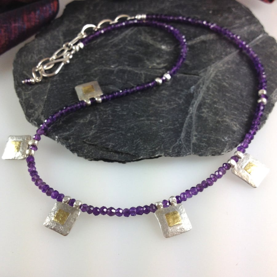 Silver 18ct gold and amethyst necklace.