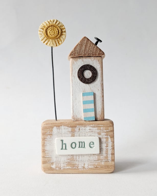 Little Wooden Hut with Clay Sunshine Flower 'Home'