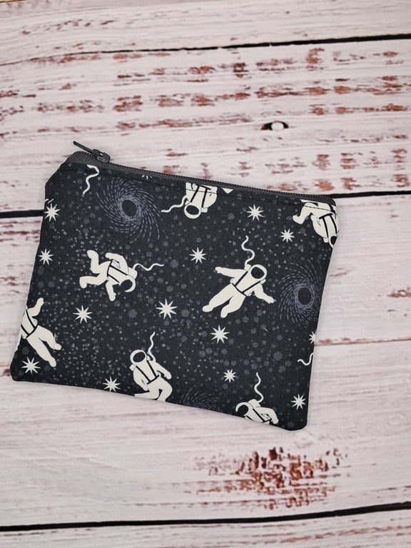 Glow in the dark astronaut space coin purse
