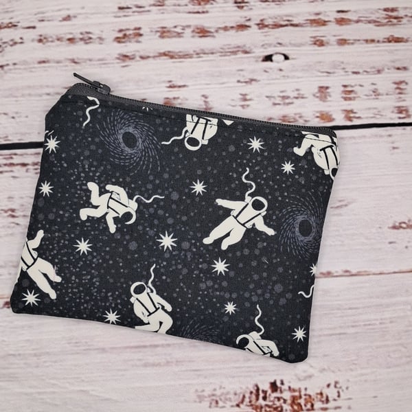 Glow in the dark astronaut space coin purse