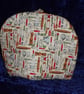 Tea Cosy with Kitchen Utensils  - Image 1
