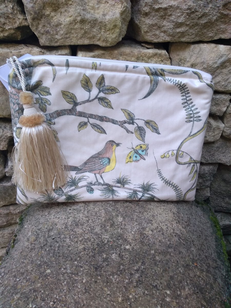 A vintage Fabric Padded Clutch or Evening Bag