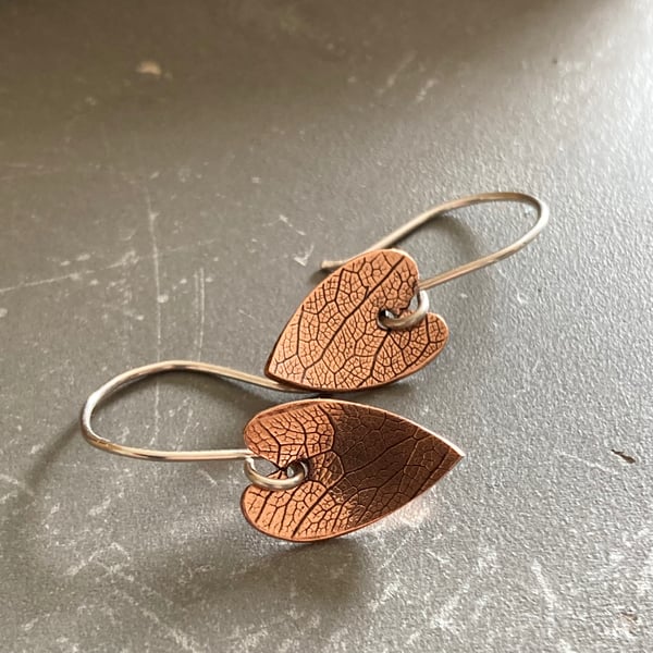 Leaf textured copper elongated heart earrings